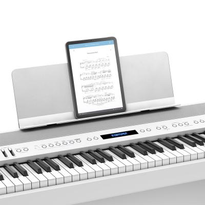 ROLAND FP-90X-WH Digital Piano ホワイト デジタルピアノ ローランド 電子ピアノ 88鍵 譜面台にタブレットを置いた画像