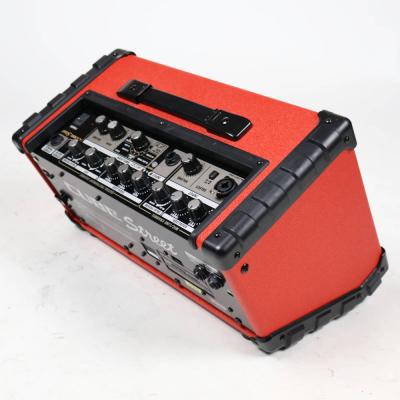 【中古】 ギターアンプ ローランド ROLAND CUBE Street RED 乾電池駆動パフォーマンス用ステレオアンプ ギターアンプ 本体画像 斜め